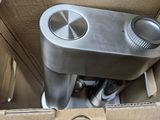 a box that has a metal device inside of it