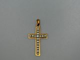 l'image d'une croix sur une surface grise