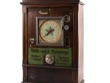 a wooden clock that is on display on the wall