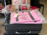 several pieces of luggage stacked on top of each other on a pallet
