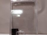 a clear box with a black object inside of it