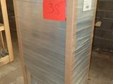 a stack of boxes that are sitting in a warehouse