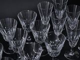 a lot of empty wine glasses sitting on a table