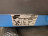 an image of a close up of a metal pipe with a label on it