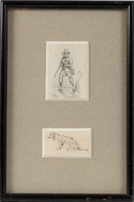 two framed drawings of a man and a dog on a table