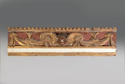 an image of a gold frame with a picture of a man and a woman on it