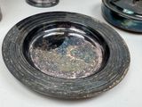 an image of a silver plate on a table