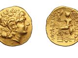 a gold coin with an image of a man on it