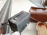 several pieces of luggage are sitting on the floor next to each other