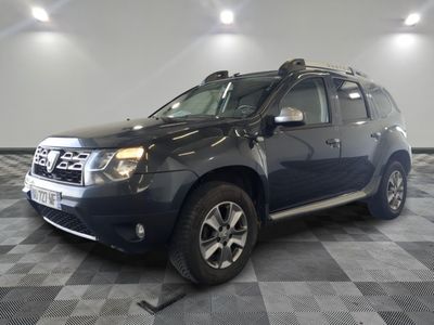 a picture of a dark colored suv parked in a showroom