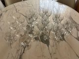 a marble table with a bunch of wine glasses on it