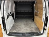a white van that is parked in a lot