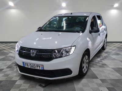 a picture of a white dacia parked in a garage