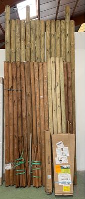 several pieces of wood are stacked on top of each other in a room