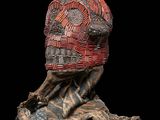 an image of a sculpture of a person with a hat on