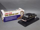 a black model of a car with a box on top of it