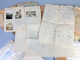 a lot of papers that are on a table