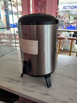 an image of a coffee pot sitting on a counter