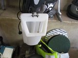 many different types of cleaning equipment on the floor