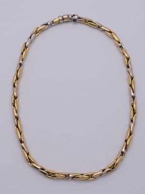 Collier en or 750 deux tons. Fermoir orné d'un cabochon. - Photo 1