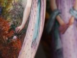 two vases that have pictures of women painted on them