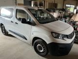 a white van that is parked in a garage