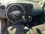 a picture of a car dashboard with a steering wheel
