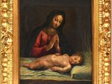 une image d'une peinture représentant une femme tenant un bébé
