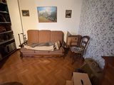 a living room with a couch and a chair in it