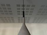 a light that is hanging from the ceiling in the room