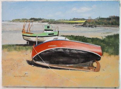 two boats that are sitting on the sand