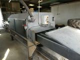 une image représentant une machine en train de fabriquer une feuille de papier