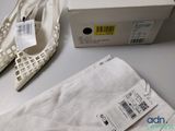 a box with a pair of shoes and a pair of pants