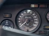 a close up of a car dashboard with various gauges