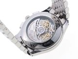 an image of a close up of a watch on a white surface