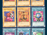 a lot of pokemon cards that are on the table