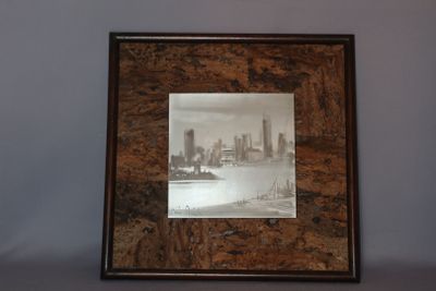 a picture of a picture of a city in a picture frame