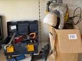 many tools on the shelf in the garage