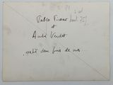 an old postcard with a handwritten message on it
