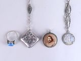 three different types of jewelry are displayed on a white surface