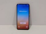 the back of a black samsung galaxy s10e phone sitting on a white surface