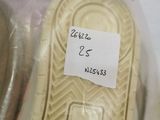 a pair of shoes that are in a plastic bag