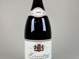 a bottle of wine that is sitting on a table