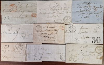 many old envelopes on the table with stamps on them