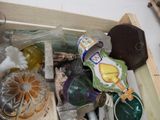 a wooden box filled with assorted items on a table