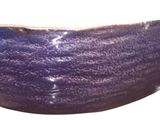 a blue bowl that is sitting on a table