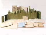 a pile of books that are sitting on a table