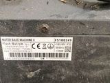an image of a machine that is sitting on the ground