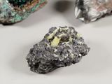 a piece of rock that has some kind of substance on it