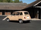 a small tan car parked in front of a building
